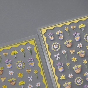 Embossed floral nail art stickers featuring yellow narcissus and purple flower patterns