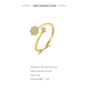 Detail of 925 sterling silver open ring with AAAAA cubic zirconia and gold plating