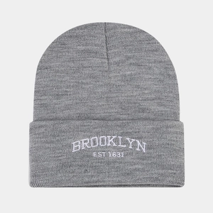 Detail of Brooklyn EST 1634 embroidery on a grey knit beanie for street fashion