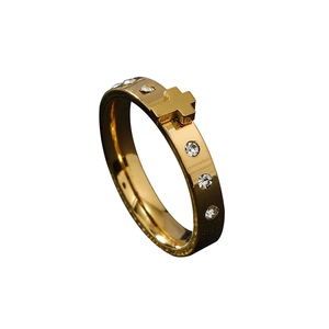 Gold stainless steel cross ring with sparkling crystals for a trendy minimalist look