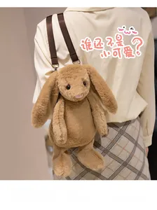 Detail of plush bunny backpack with soft brown fur and durable nylon straps on model