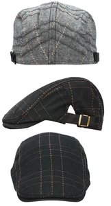 Detail of adjustable metal buckle and classic plaid pattern on British style flat cap