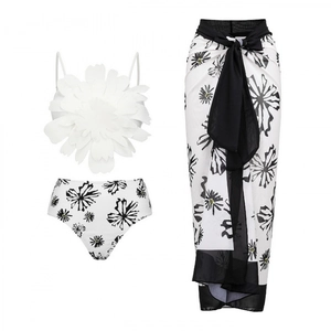 Three-piece black and white swimsuit with 3D floral top and floral sarong beach set