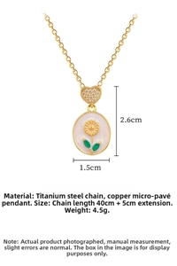 Detailed view of titanium steel gold necklace with heart clasp and floral pendant charm
