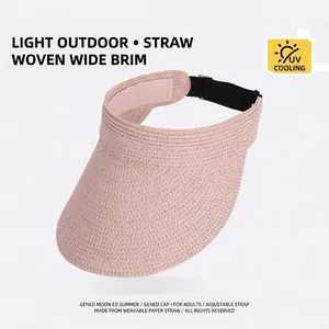 Pink straw sun visor hat with wide brim and elastic strap for outdoor UV protection