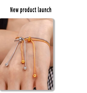 Adjustable snake bone chain bracelets in gold and silver finish with sliding clasp detail