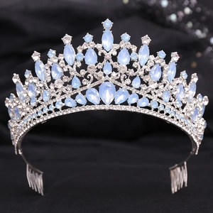 Detail of silver alloy bridal tiara with light blue crystals and micro-inlaid rhinestones