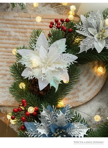 Sparkly white, silver, and blue Christmas flowers with berries and LED light string
