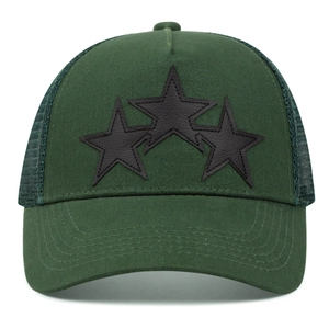 Front view of green star patch trucker hat with mesh back and curved brim for outdoors