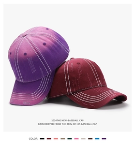Close-up of distressed baseball caps with contrast stitching and worn-out details
