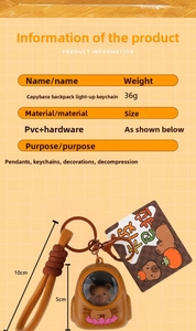 Detailed view of Capybara backpack keychain with light-up function and size dimensions