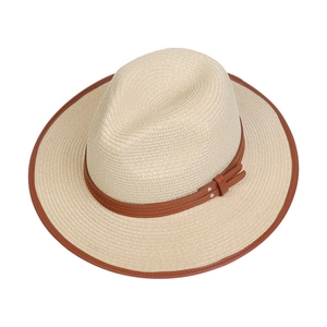 Detailed top view of beige straw jazz hat showing woven texture and brown leather trim