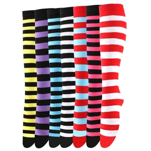 Detailed knit texture of colorful striped over-the-knee socks in seven vibrant patterns