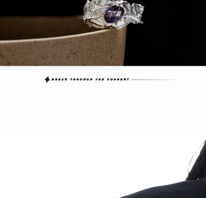 Detail of S925 sterling silver ring with organic texture and faceted purple gemstone