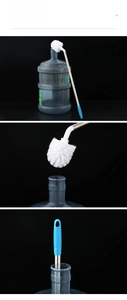 Detail of the white spherical nylon brush head and stainless steel long handle for cleaning