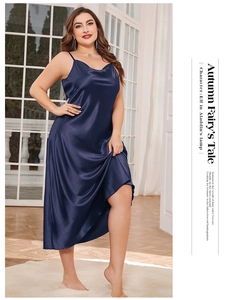 Detail of elegant dark blue satin nightgown showing luxurious silk-like texture and sheen