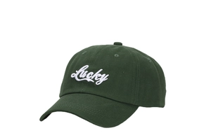 Detailed close-up of dark green baseball cap with white Lucky embroidery texture