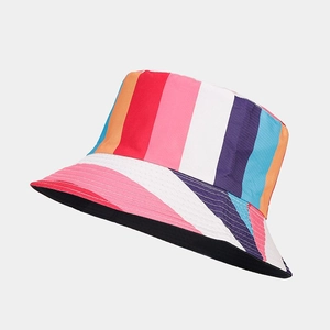 Macro detail of vibrant rainbow striped bucket hat featuring high-quality woven fabric