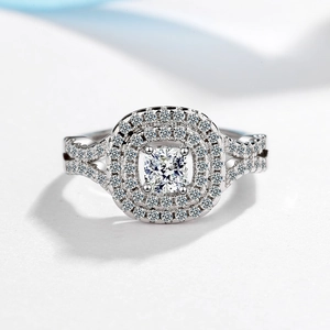 Sparkling cushion cut double halo silver ring with a split shank and clear zircons