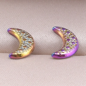 Macro shot of 304 stainless steel crescent moon earrings with iridescent dotted texture