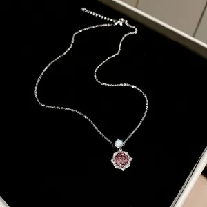 14k gold plated necklace featuring a rose flower pendant with pink zircon in center