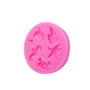 Pink silicone mold with seahorse dolphin and starfish shapes for DIY fondant or soap crafts
