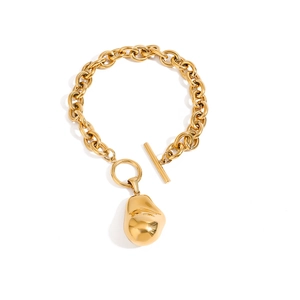 Luxurious 18k gold plated titanium steel link bracelet with bold OT buckle and molten pendant