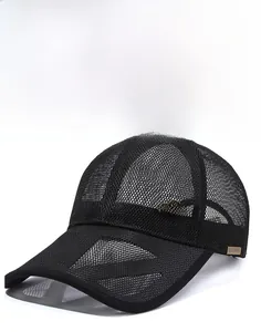 Detail of black mesh baseball cap showing breathable fabric and gold car emblem