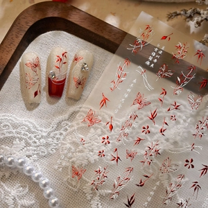 Ink-style bamboo and floral nail art stickers with butterfly designs in red and white