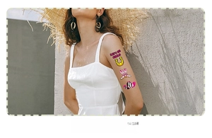 Detail of pink cowgirl temporary tattoos with boots, horseshoe, and cowboy hat designs