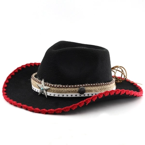 Detail of black western cowboy hat featuring red woven edges and silver star buckle