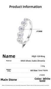 Macro detail of S925 sterling silver ring with five heart-shaped cubic zirconia stones
