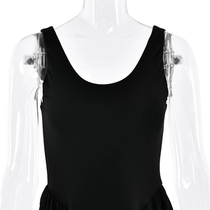 Detail of a sleek black backless dress showing high-slit cut and premium elastic fabric