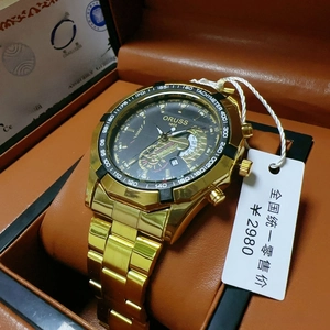 Detail of ORUSS gold chronograph watch with black dial in leather case and tachymeter
