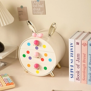 Detailed side view of 3-tier rabbit ear desk organizer with colorful polka dots