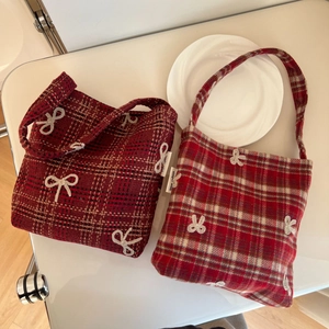 Red plaid wool tote bags with white bow embroidery in deep and bright crimson tones