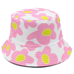 Close-up of vibrant pink floral print on a white double-sided summer bucket hat fabric