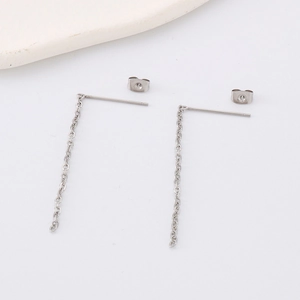 Detailed view of silver minimalist long chain earrings with fine cable links and post backs