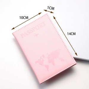 Pink PU leather passport cover with embossed map and plane design showing 14cm height detail