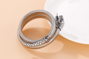Macro shot of cobra snake bracelet in antique silver finish with detailed scale texture