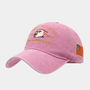 Detail of gold embroidery on washed pink 250th Anniversary United States baseball hat