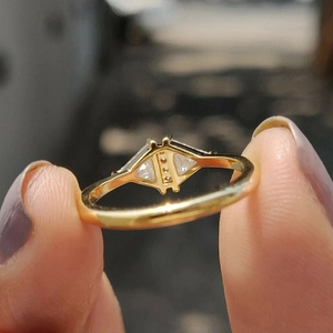 Minimalist gold geometric triangle ring with three micro-set cubic zirconia stones