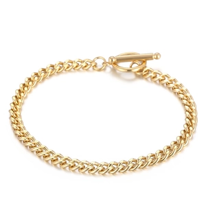 Polished gold stainless steel curb chain bracelet featuring a stylish OT toggle clasp