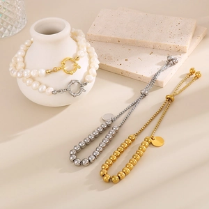 Bracelets à billes en or 18 carats et argent et chaînes de perles avec fermoirs à bascule