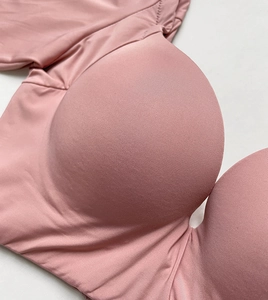 Detailed macro view of seamless lotus root pink bra fabric and 3D cup structure