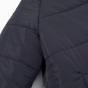 Detailed macro view showing the quilted texture and durable fabric of this winter coat