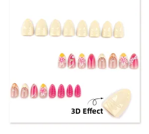 Detail of almond nails featuring 3D floral textures, pink gradient, and pearl accents