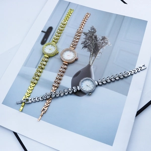 Three elegant crystal leaf quartz bracelet watches in gold, rose gold, and silver finishes