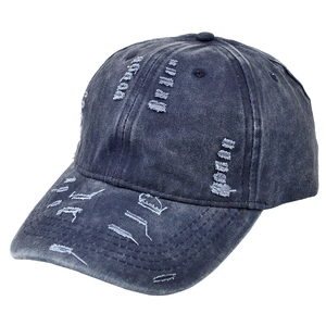Distressed vintage washed denim baseball cap with street style ripped hole details