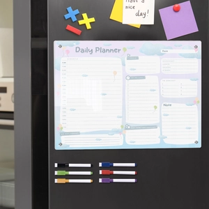 Magnetic acrylic daily planner with six colorful markers on a black refrigerator